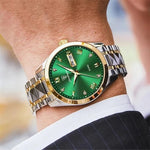 Luxury watch with green face and gold accents on a wrist, mensgood watches collection
