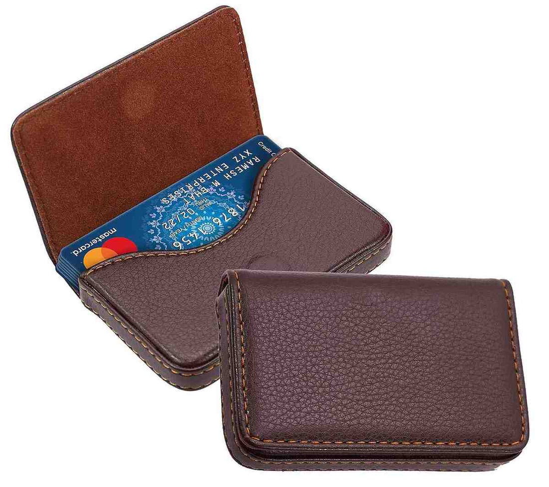 Brown leather cardholder with a blue card inserted on a white background